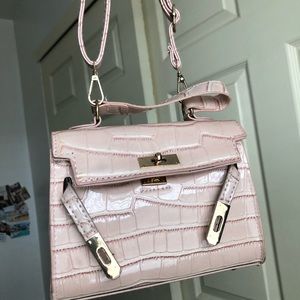 Pink crocodile print bag